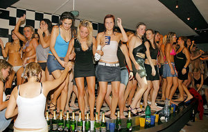 Sexy beauty Danielle wearing tights & short skirt licks pussy at lesbian party